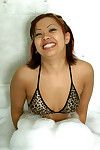 Amateur MILF Gia doffing bikini in bathtub to masturbate her Asian pussy