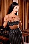 Elegant oriental babe Jade Vixen with big tits and long legs strips put of her narrow latex costume