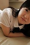 Asian babe Ayane Ikeuchi posing in skirt and pantyhose bares tiny tits