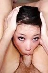 Dark haired Asian babe Lily Ocean sucks and licks a hard boner on her knees