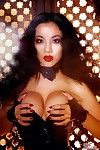 Glam asian Jade Vixen takes off her short tight latex dress and spreads her ultra long legs