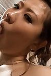 Cute Asian Ai Yuumi puts on sleazy stockings and gives her man some oral sex