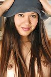 Asian first timer in hat revealing small billibongs during babe photo shoot
