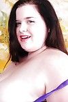 Dark brown fatty Linda teases her standard big breasts and shaved bawdy cleft