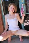 Aubrey Belle peels off her jeans and panties outside to show her pink love box