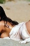 Smoking hot rounded latina babe Monica Mendez with wet black hair poses naked on the beach