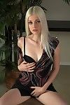 Small titted white-haired babe Charlotte Stokely takes off her ebony underwear