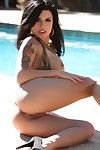 Hot bikini cutie Eva Angelina shows off her untamed butt and big boobs by the pool