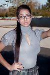 Brunette with sexy glasses flashes her naughty panties in public and shows off her big tits