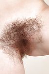 Older broad with furry legs loosing hairy vagina from swimsuit in bathtub