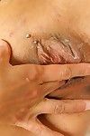 Busty mature woman turns shower spray upon wet pussy while masturbating