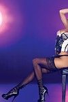 Stunning lingerie-clad brunette model Vida Guerra in stockings shows off her perfect legs