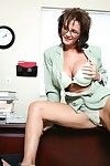 Huge titted sexpot Deauxma in glasses rides cock like crazy in the office.