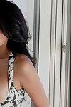 Raven haired Jasmine Foxxx in ultra short sexy dress gets her perfect big tits out