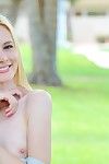 White haired pale skinned girl Kennedy Kressler flashes her little pussy outdoors