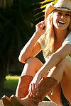 Sweet blonde likes to pose her sexy panties in amazing outdoor show