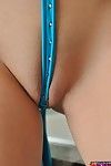 Big meloned brunette Sweet Krissy with shaved pussy poses in revealing blue bikini