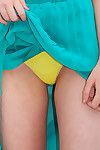 Blue eyes Kelly Lamprin teases by gently showing her sexy ass and her naughty panties