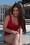 Ryder Skye removes her red swimsuit to show her tattoos and get penetrated