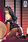 Boobsy eastern in high heels Asia Carrera takes off her cute suit and strings