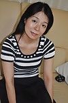 Sexually excited eastern MILF Akiko Oda getting without clothes and expanding her cunt lips