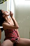 Infant Eastern woman Peggy blows soapy bubbles on her gentile